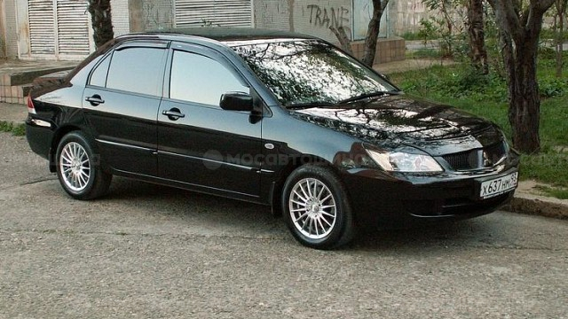 Диски Racing Wheels Classic H-155 R16 на автомобиле Mitsubishi Lancer [105]