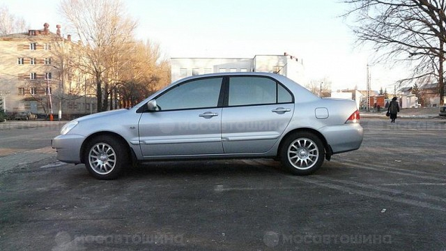 Диски Всмпо Вега + R15 на автомобиле Mitsubishi Lancer [103]