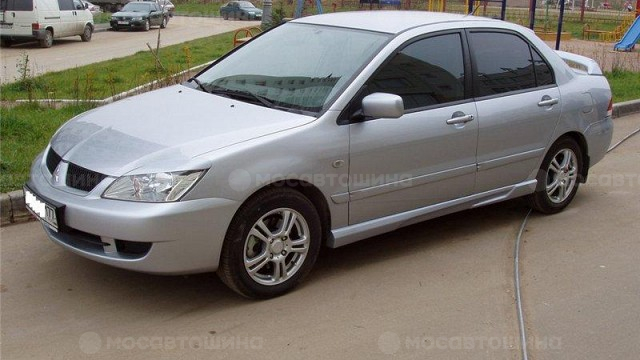 Диски Mitsubishi MI6 R16 на автомобиле Mitsubishi Lancer [95]